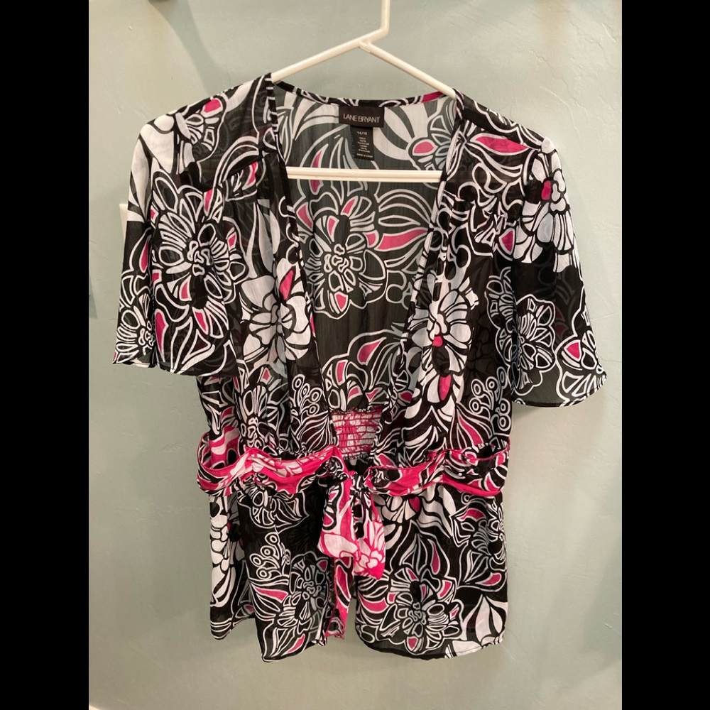 Vintage blouse with black, white, and hot pink colors/excellent condition!